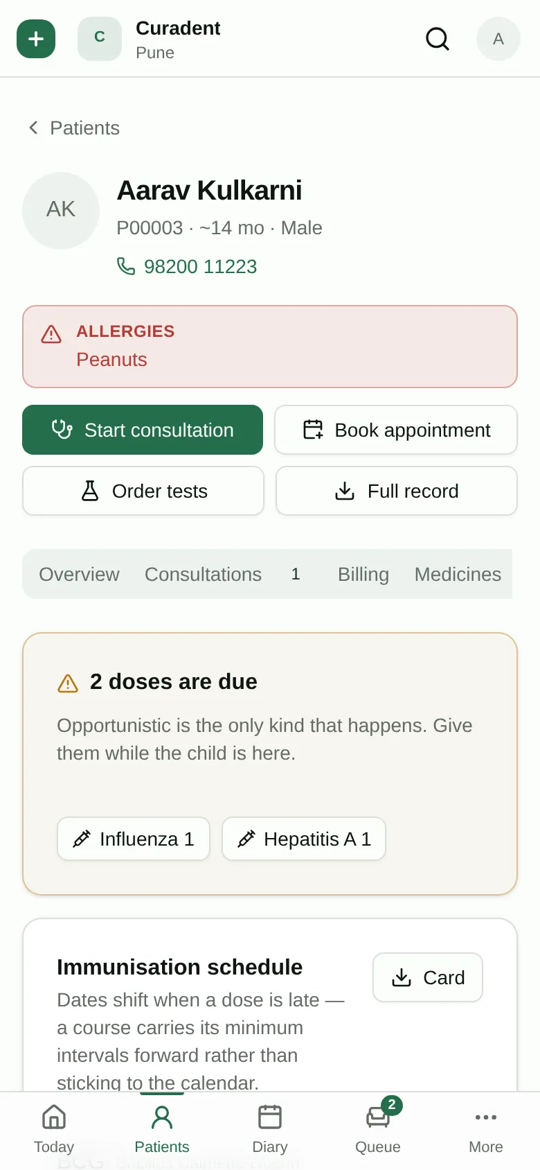 A child's immunisation schedule on a phone.
